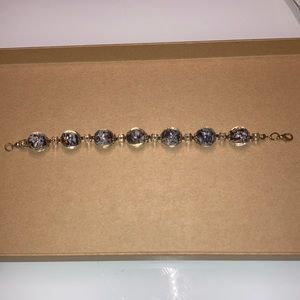 bracelet with blue white and rose gold colors